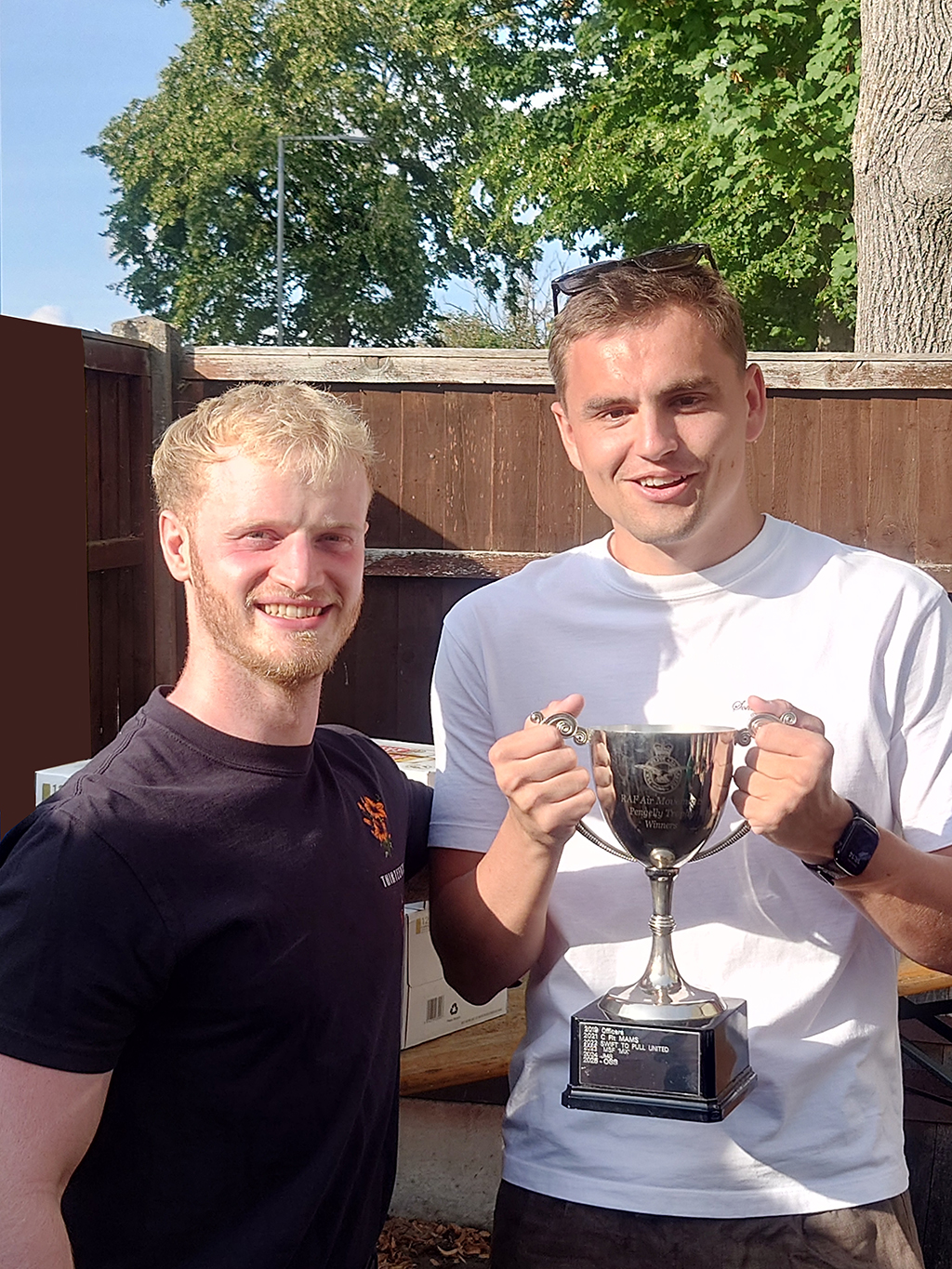 Smiling members of Movements Conversion Unit, proudly display the Pengelly Cup for the first time.